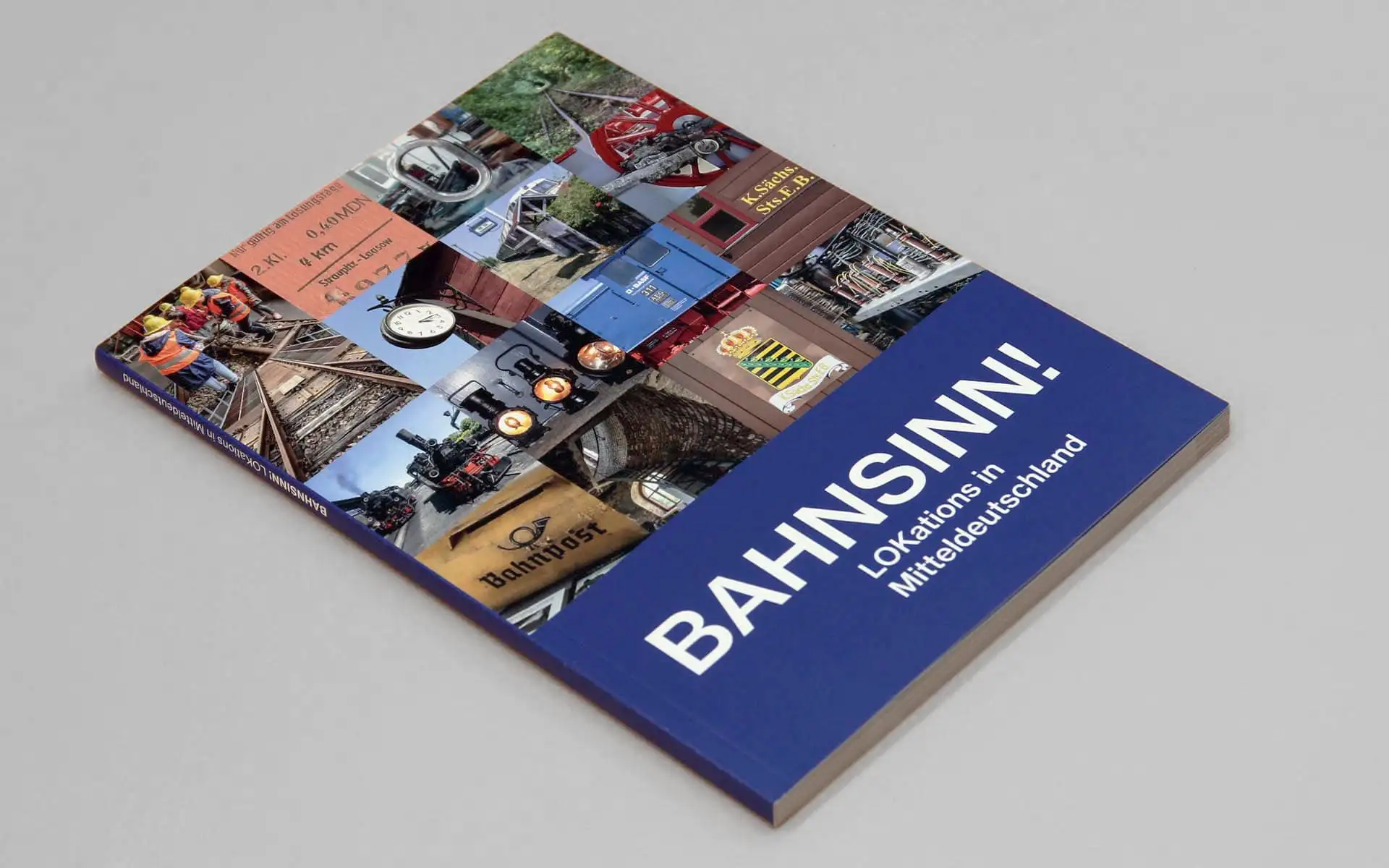 Broschur „Bahnsinn!“ mit grafischem Titelbild und groß gesetzter Typografie auf farbigen Flächen.